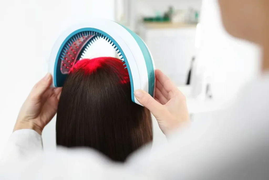 Red light therapy cap delivering therapeutic wavelengths to the scalp